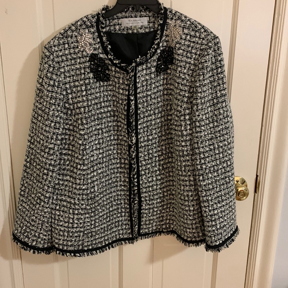 Stunning jacket by Tahari. Embellished black and white Chanel style jacket.